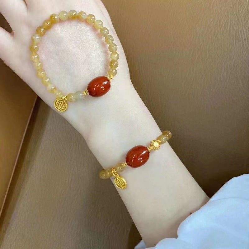 Xiaohongshu bestseller: Caramel-colored beeswax bracelet, stone music pendant, Chinese style, elegant niche design