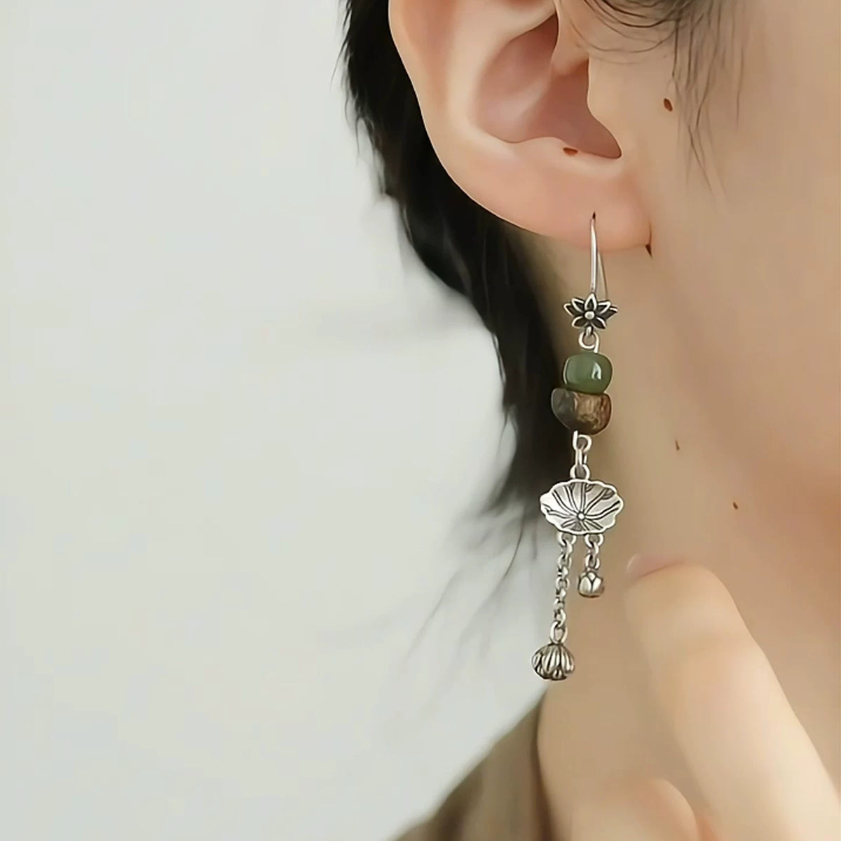 925 silver new Chinese retro ethnic style old lotus leaf lotus pod earrings asymmetrical female high-end ear hooks are versatile