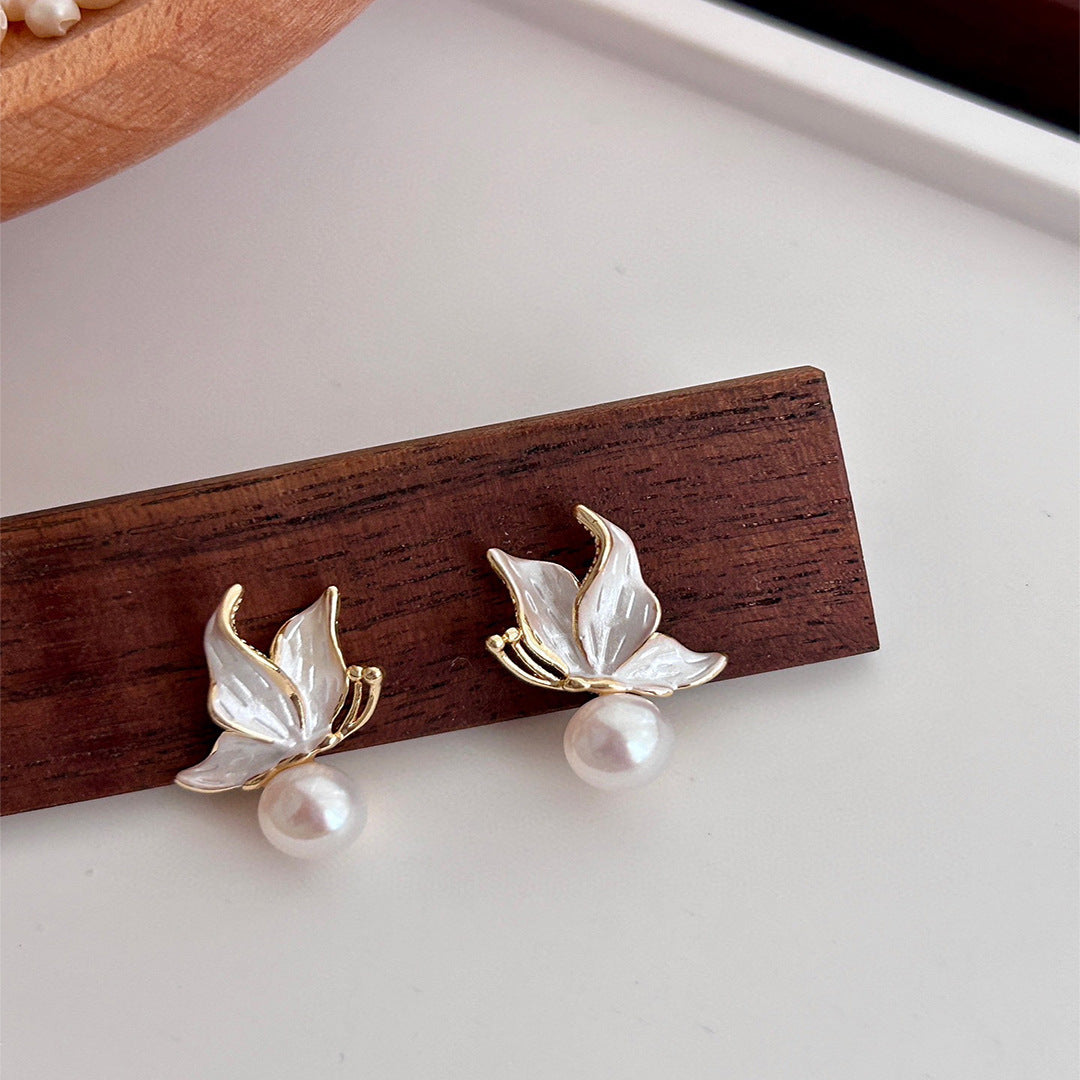S925 silver needle natural freshwater pearl stud earrings temperament niche light luxury high-end drop glaze butterfly earrings women's new model