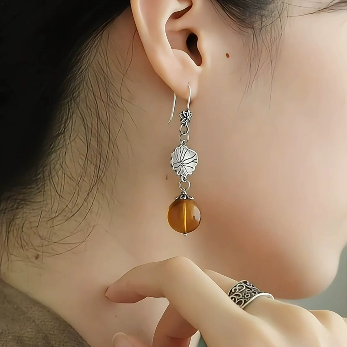 925 silver new Chinese retro ethnic style old lotus leaf lotus pod earrings asymmetrical female high-end ear hooks are versatile