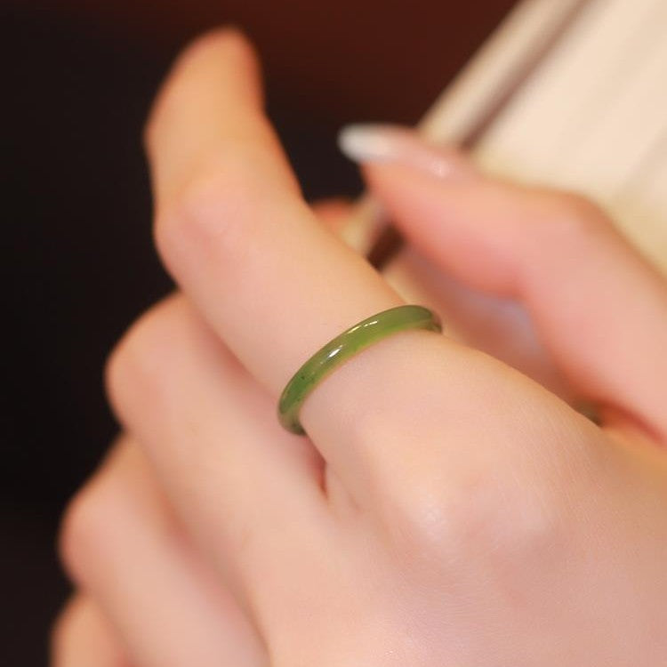 It is designed for the late wave point kiwi natural Hetian jade jasper spinach green jade ring plain circle jade ring niche design