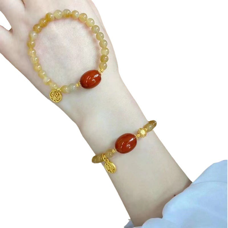 Xiaohongshu bestseller: Caramel-colored beeswax bracelet, stone music pendant, Chinese style, elegant niche design