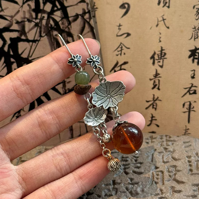 925 silver new Chinese retro ethnic style old lotus leaf lotus pod earrings asymmetrical female high-end ear hooks are versatile
