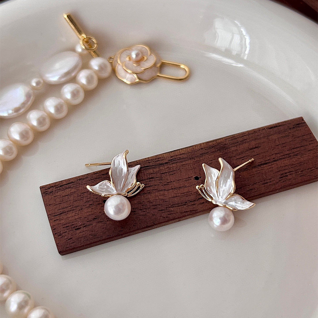 S925 silver needle natural freshwater pearl stud earrings temperament niche light luxury high-end drop glaze butterfly earrings women's new model