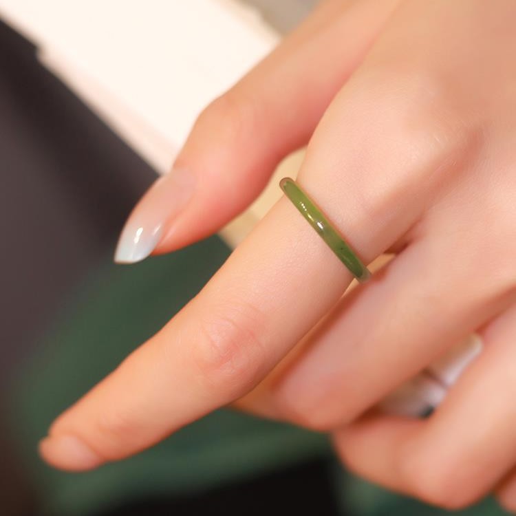 It is designed for the late wave point kiwi natural Hetian jade jasper spinach green jade ring plain circle jade ring niche design