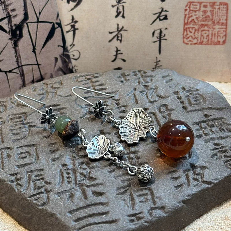 925 silver new Chinese retro ethnic style old lotus leaf lotus pod earrings asymmetrical female high-end ear hooks are versatile