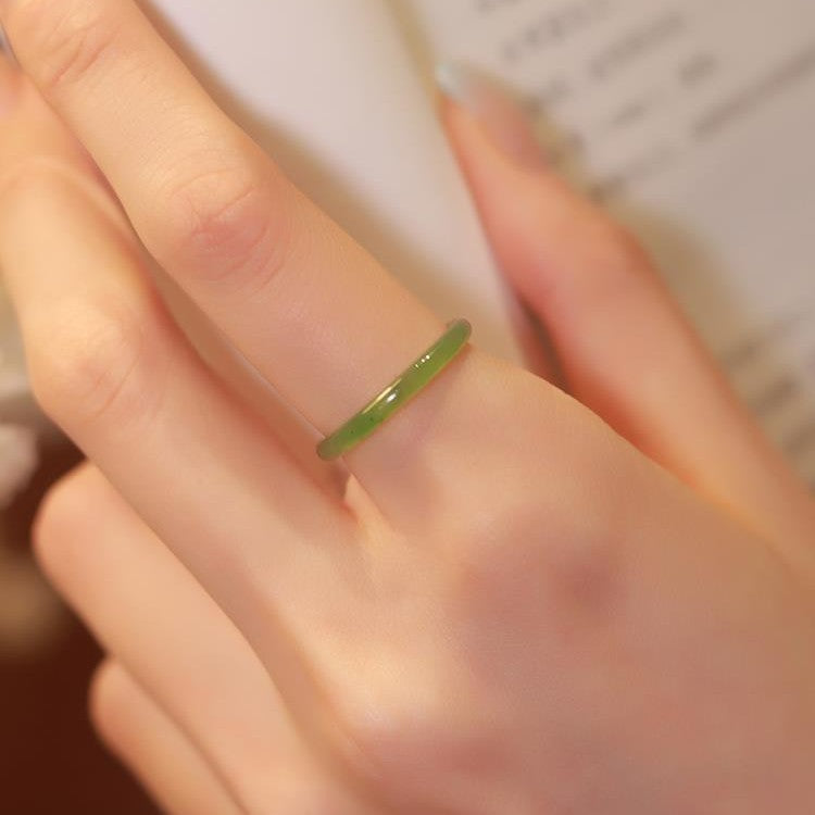 It is designed for the late wave point kiwi natural Hetian jade jasper spinach green jade ring plain circle jade ring niche design