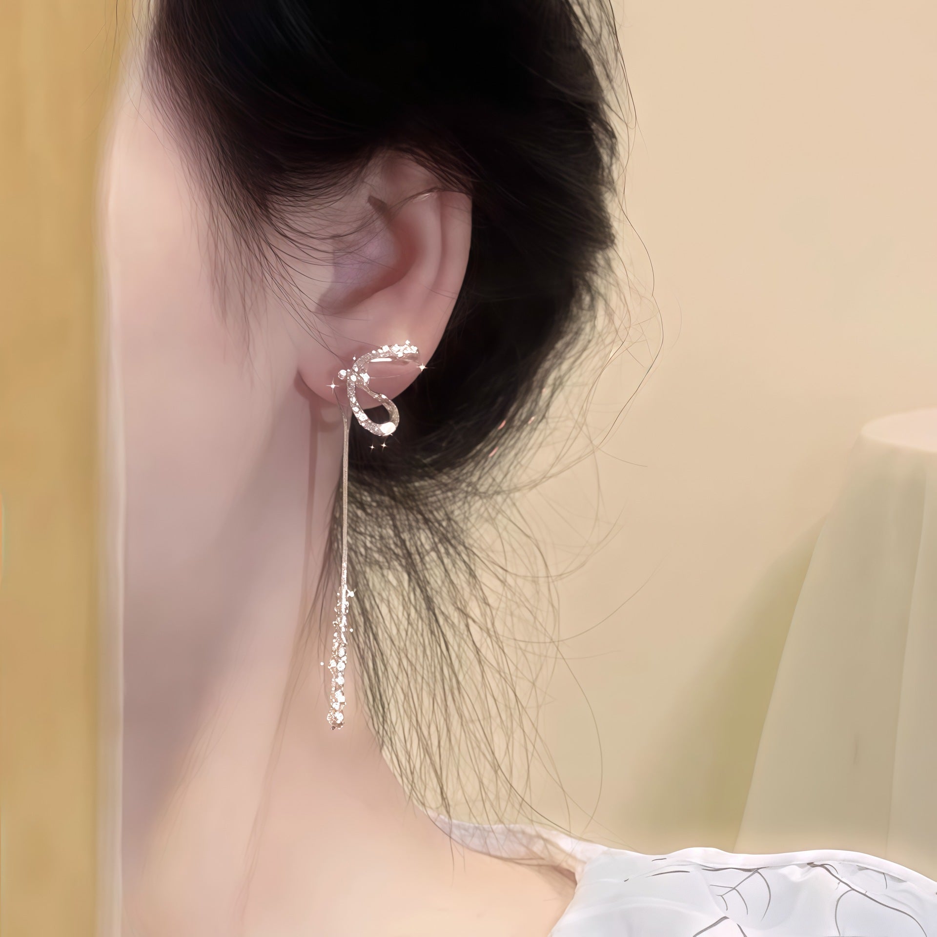 S925 sterling silver needle ultra-sparkling bow tassel earrings for women, light luxury high-end earrings, elegant versatile earrings