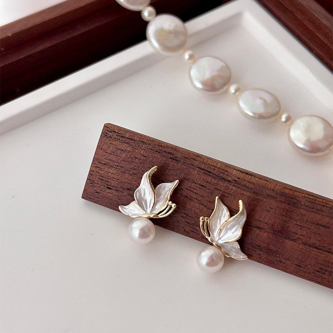 S925 silver needle natural freshwater pearl stud earrings temperament niche light luxury high-end drop glaze butterfly earrings women's new model
