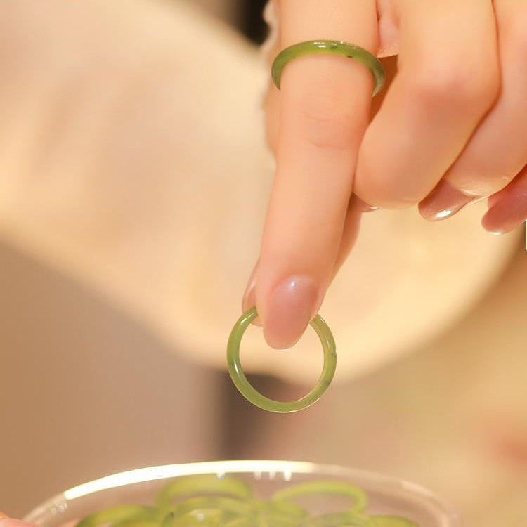 It is designed for the late wave point kiwi natural Hetian jade jasper spinach green jade ring plain circle jade ring niche design