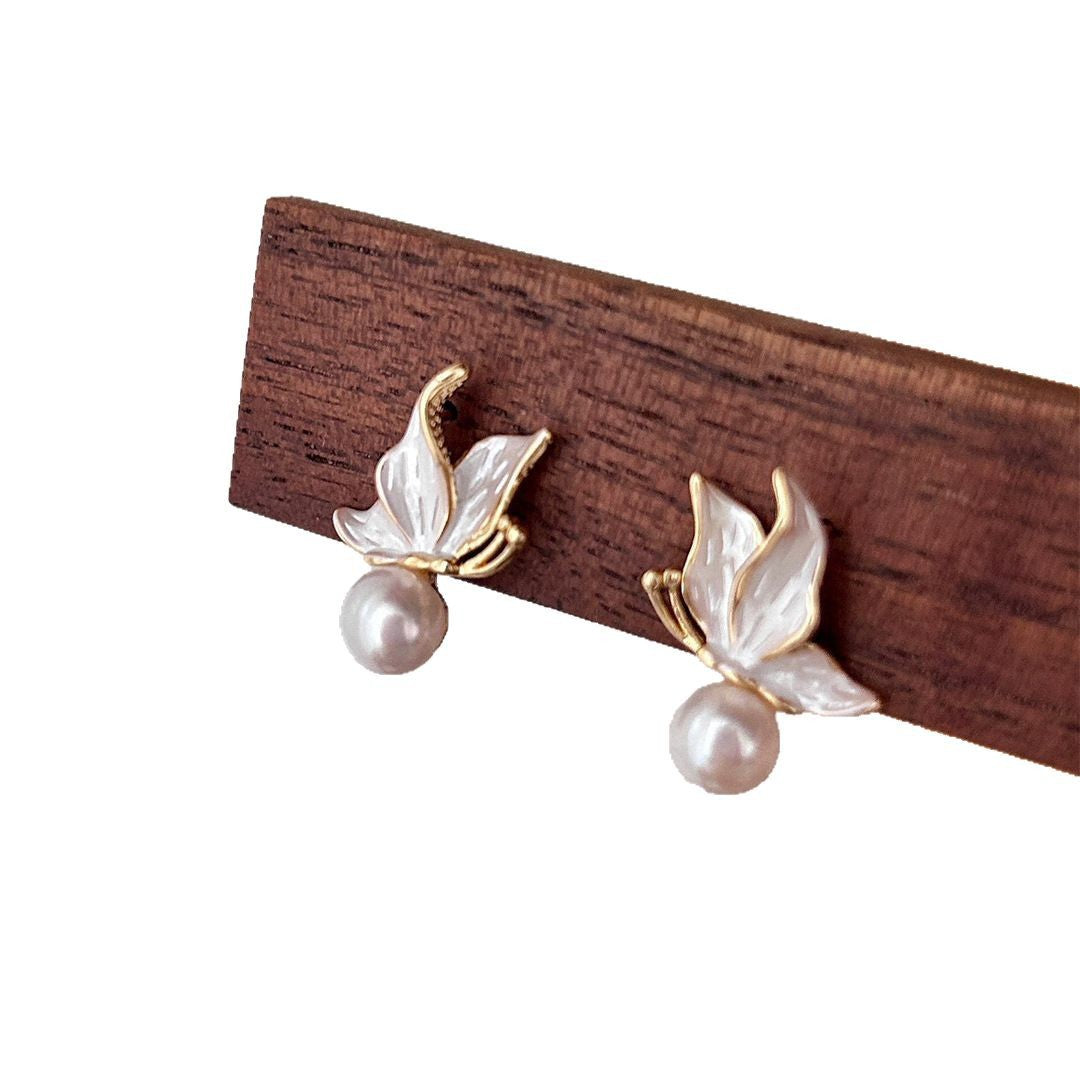 S925 silver needle natural freshwater pearl stud earrings temperament niche light luxury high-end drop glaze butterfly earrings women's new model