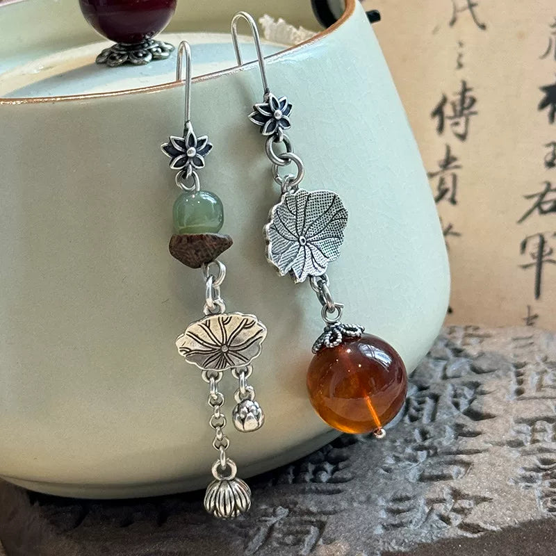 925 silver new Chinese retro ethnic style old lotus leaf lotus pod earrings asymmetrical female high-end ear hooks are versatile